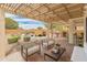 Relaxing backyard oasis with pergola, pool, and patio at 26234 W Behrend Dr, Buckeye, AZ 85396