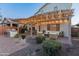 Entertaining backyard with pergola, patio, and seating at 26234 W Behrend Dr, Buckeye, AZ 85396