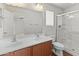 Bathroom with double vanity, shower and toilet at 26234 W Behrend Dr, Buckeye, AZ 85396