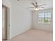 Bright bedroom with window and access to bathroom at 26234 W Behrend Dr, Buckeye, AZ 85396