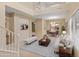 Bright, spacious living room with vaulted ceilings and an open floor plan leads into the dining area at 26234 W Behrend Dr, Buckeye, AZ 85396