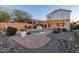 Relaxing backyard with pool, fountain and patio at 26234 W Behrend Dr, Buckeye, AZ 85396