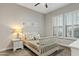 Bright bedroom with white furniture and plantation shutters at 2683 E Indigo Pl, Chandler, AZ 85286