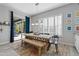 Bright dining area with farmhouse table and backyard access at 2683 E Indigo Pl, Chandler, AZ 85286