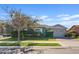 Single-story home with gray exterior, two-car garage, and well-manicured lawn at 2683 E Indigo Pl, Chandler, AZ 85286