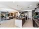 Gourmet kitchen with seamless flow to the living room, featuring a large island and stainless steel appliances at 2901 E Iris Dr, Chandler, AZ 85286
