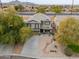 An aerial view of a two story home in a suburban neighborhood at 35598 N Murray Grey Dr, San Tan Valley, AZ 85143