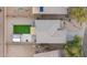 Overhead shot displays the property layout, with a tidy backyard featuring artificial turf and pergola at 35598 N Murray Grey Dr, San Tan Valley, AZ 85143