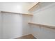 Spacious walk-in closet with ample shelving and hanging space at 3703 E Mitchell Dr, Phoenix, AZ 85018