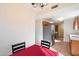 Small dining area with red tablecloth and chandelier at 3703 E Mitchell Dr, Phoenix, AZ 85018