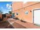 Small patio area with brick pavers and exterior access at 3703 E Mitchell Dr, Phoenix, AZ 85018