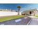Artificial turf backyard, storage shed, and hammock at 3714 E Amelia Ave, Phoenix, AZ 85018