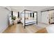 Bedroom with canopy bed and plenty of natural light at 3714 E Amelia Ave, Phoenix, AZ 85018