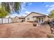 Large backyard with covered patio and fire pit at 4510 N 84Th Ave, Phoenix, AZ 85037