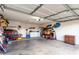 Two-car garage with washer, dryer, and ample storage at 4510 N 84Th Ave, Phoenix, AZ 85037