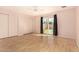 Bedroom with sliding door to the backyard pool at 4511 W Sandra Ter, Glendale, AZ 85306
