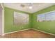Bedroom showcasing wood floors and a nature-themed print at 4511 W Sandra Ter, Glendale, AZ 85306