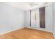 Bright bedroom with wood-look floors and ceiling fan at 4511 W Sandra Ter, Glendale, AZ 85306