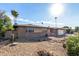 Ranch style home with a spacious yard and desert landscaping at 4511 W Sandra Ter, Glendale, AZ 85306