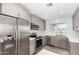 Updated kitchen featuring stainless steel appliances at 4511 W Sandra Ter, Glendale, AZ 85306