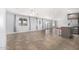 Open living room and kitchen area with tile flooring at 4511 W Sandra Ter, Glendale, AZ 85306