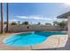 Inviting kidney shaped pool with surrounding concrete patio at 4511 W Sandra Ter, Glendale, AZ 85306