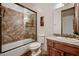Bathroom with shower/tub combo, tile flooring, and vanity at 4590 S Gold Canyon Dr, Gold Canyon, AZ 85118