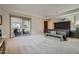 Spacious Primary suite with a king-size bed and private access to deck at 4590 S Gold Canyon Dr, Gold Canyon, AZ 85118