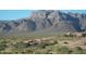 Luxury homes nestled in a scenic desert landscape with mountain views at 4590 S Gold Canyon Dr, Gold Canyon, AZ 85118