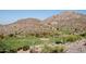 Elevated view of the green and surrounding desert landscape at 4590 S Gold Canyon Dr, Gold Canyon, AZ 85118