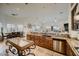 Open kitchen with stainless steel appliances and granite countertops at 4590 S Gold Canyon Dr, Gold Canyon, AZ 85118
