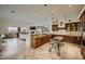 Spacious kitchen featuring granite countertops, ample cabinetry, and views at 4590 S Gold Canyon Dr, Gold Canyon, AZ 85118