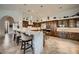 Gourmet kitchen with modern cabinetry, large island and tile floors at 4590 S Gold Canyon Dr, Gold Canyon, AZ 85118