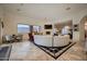 Open living space with a curved sectional sofa and mountain views at 4590 S Gold Canyon Dr, Gold Canyon, AZ 85118