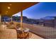 Relaxing patio with seating and mountain views at 4590 S Gold Canyon Dr, Gold Canyon, AZ 85118