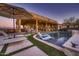 Resort-style pool with patio and lounge chairs at 4590 S Gold Canyon Dr, Gold Canyon, AZ 85118