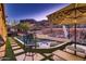 Relaxing pool area with patio furniture at 4590 S Gold Canyon Dr, Gold Canyon, AZ 85118