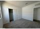 Bedroom featuring neutral carpeting and a closet at 46905 W Old Timer Rd, Maricopa, AZ 85139