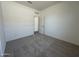 Comfortable bedroom featuring neutral carpeting and a closet at 46905 W Old Timer Rd, Maricopa, AZ 85139