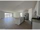 Open concept kitchen featuring a center island, stainless steel appliances, and ample cabinet space at 46905 W Old Timer Rd, Maricopa, AZ 85139