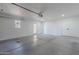Spacious garage with automatic door opener and extra storage at 4914 E Lake Point Cir, Phoenix, AZ 85044