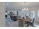 Updated kitchen features a large island, stainless steel appliances, and a breakfast nook at 4914 E Lake Point Cir, Phoenix, AZ 85044