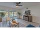 Living room boasts lake views and a tranquil atmosphere with stylish decor at 4914 E Lake Point Cir, Phoenix, AZ 85044
