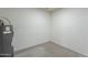 Small utility room with water heater and ample space at 4914 E Lake Point Cir, Phoenix, AZ 85044