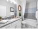 Clean and functional bathroom with a tub and shower at 4928 W Capistrano Ave, Laveen, AZ 85339