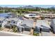 Aerial view of homes featuring desert landscaping, modern exteriors, and community amenities nearby at 6727 N 9Th Dr, Phoenix, AZ 85013
