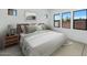 Cozy bedroom with a comfortable bed and plenty of natural light from the windows at 6727 N 9Th Dr, Phoenix, AZ 85013