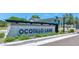 Street view of the Ocotillo Lane neighborhood entrance featuring attractive monument signage and landscaping at 6727 N 9Th Dr, Phoenix, AZ 85013