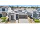 Charming modern home with neutral stucco, stone accents, stylish garage door and desert landscaping at 6727 N 9Th Dr, Phoenix, AZ 85013