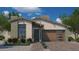 Single-story home with brown garage door and desert landscaping at 6727 N 9Th Dr, Phoenix, AZ 85013